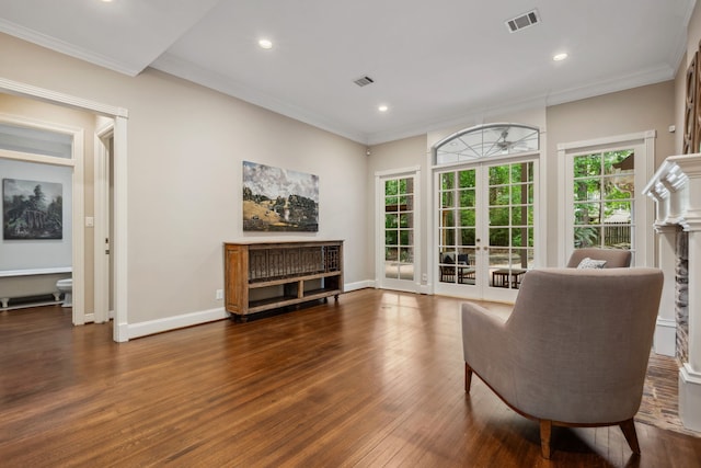 12126 Oak Park Dr, Houston, TX 77070 - sitting room with wood-type flooring, recessed lighting, a fireplace, ornamental molding, and baseboards