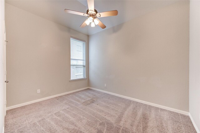 28418 Asher Falls Ln, Fulshear, TX 77441 - empty room featuring light colored carpet, baseboards, and a ceiling fan