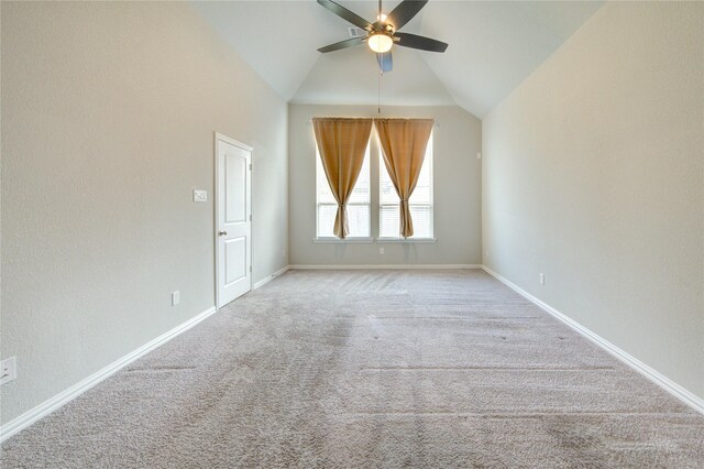 28418 Asher Falls Ln, Fulshear, TX 77441 - carpeted empty room featuring a ceiling fan, vaulted ceiling, and baseboards