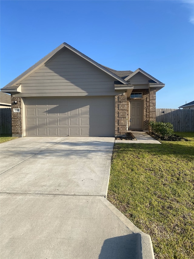 17768 Lionheart Rd, Conroe, TX 77306 - ranch-style house with brick siding, driveway, and an attached garage