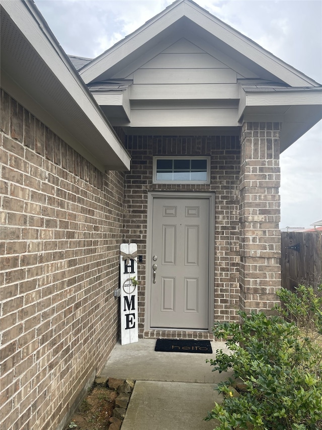 17768 Lionheart Rd, Conroe, TX 77306 - view of exterior entry featuring brick siding