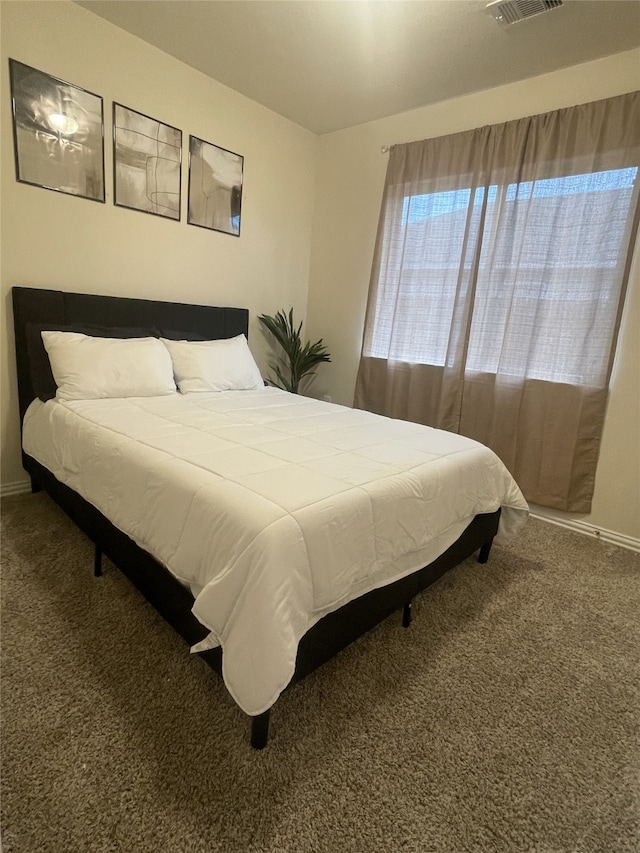 17768 Lionheart Rd, Conroe, TX 77306 - bedroom featuring carpet floors and baseboards
