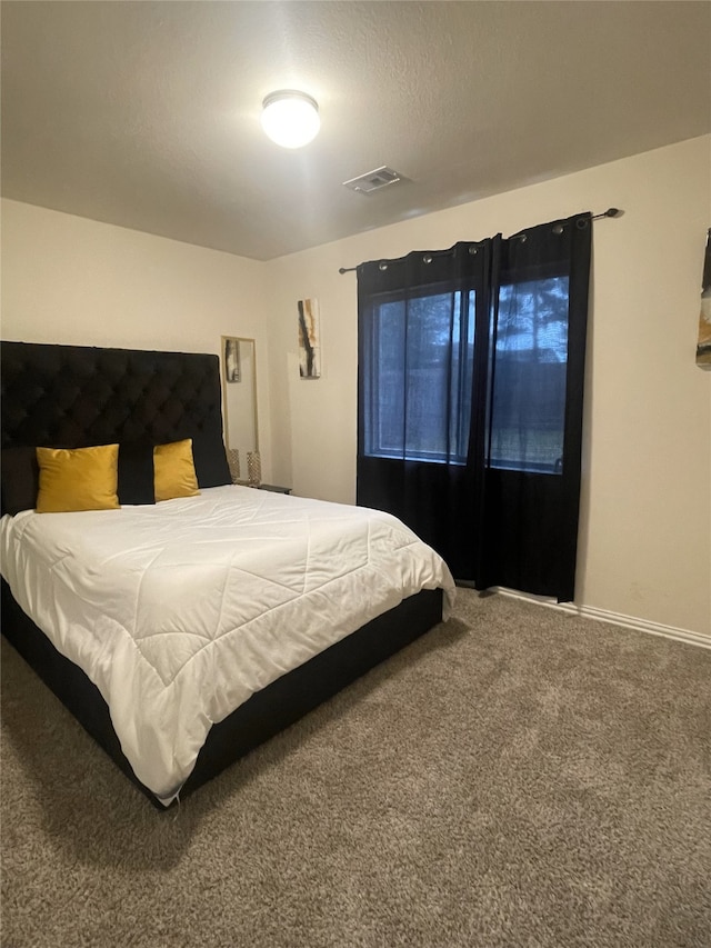 17768 Lionheart Rd, Conroe, TX 77306 - bedroom featuring carpet and baseboards