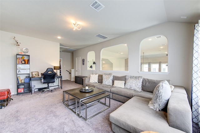 11702 Twin Creeks Hill Dr, Cypress, TX 77433 - carpeted living area with a desk, arched walkways, and vaulted ceiling