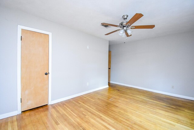 4721 Briarbend Dr, Houston, TX 77035 - unfurnished room with light wood finished floors, ceiling fan, and baseboards