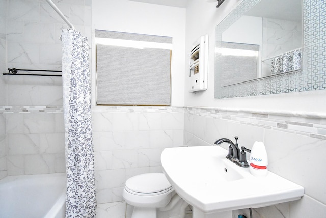 4721 Briarbend Dr, Houston, TX 77035 - bathroom featuring tile walls, toilet, a sink, and shower / bath combo