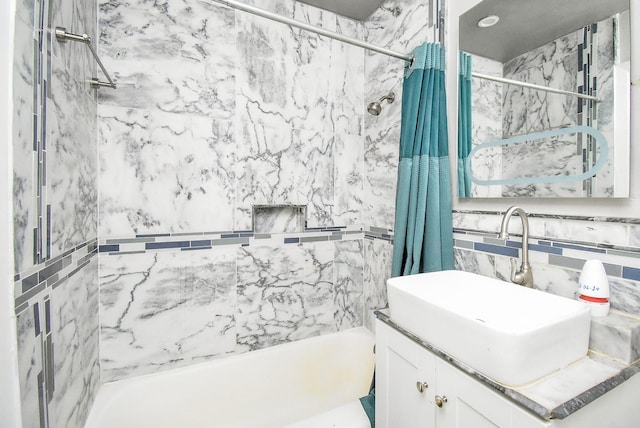 4721 Briarbend Dr, Houston, TX 77035 - bathroom featuring shower / bath combo and vanity