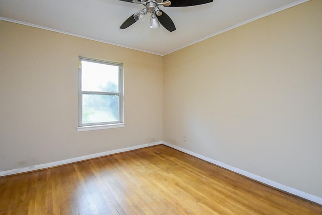 4721 Briarbend Dr, Houston, TX 77035 - unfurnished room featuring light wood-style floors, baseboards, ceiling fan, and crown molding