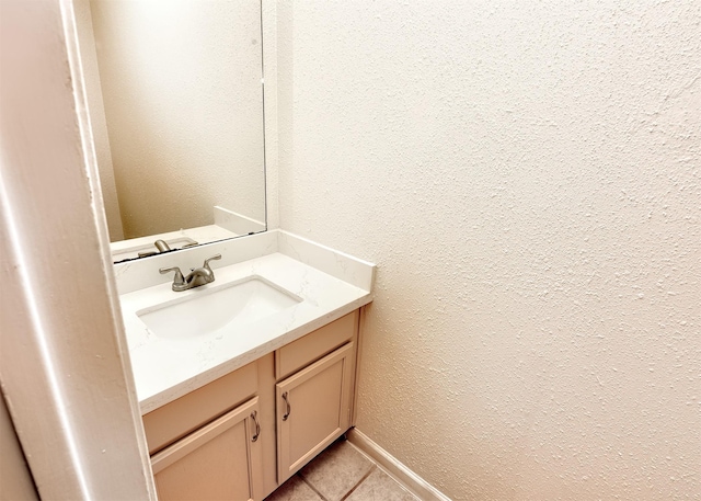 194 Moonridge Dr, Houston, TX 77015 - bathroom featuring vanity, tile patterned flooring, and a textured wall