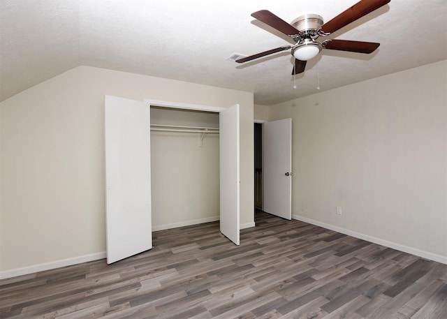 194 Moonridge Dr, Houston, TX 77015 - unfurnished bedroom featuring wood finished floors, baseboards, a closet, ceiling fan, and a textured ceiling