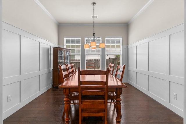 122 Cherry Oak Ln, Montgomery, TX 77316 - dining space featuring a decorative wall, a chandelier, dark wood-type flooring, and ornamental molding