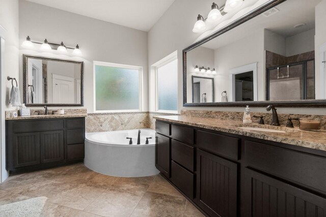 122 Cherry Oak Ln, Montgomery, TX 77316 - bathroom featuring a shower stall, two vanities, and a garden tub