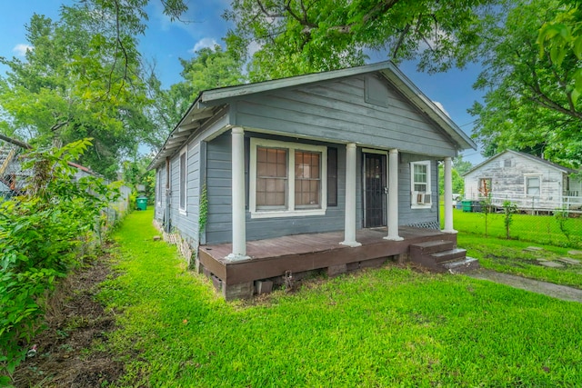 7988 Joy St, Houston, TX 77028 - shotgun-style home with a porch