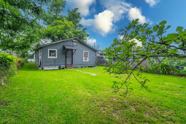 7988 Joy St, Houston, TX 77028 - rear view of house featuring entry steps