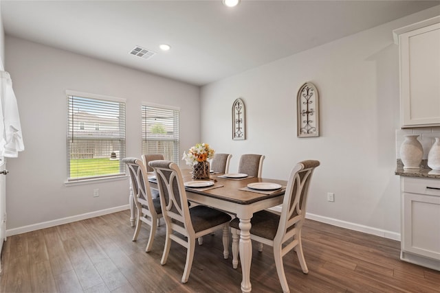 5732 Palm Flower Dr, Montgomery, TX 77316 - dining area with wood finished floors, baseboards, and recessed lighting