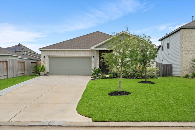 5732 Palm Flower Dr, Montgomery, TX 77316 - view of front facade with a garage, driveway, brick siding, and roof with shingles