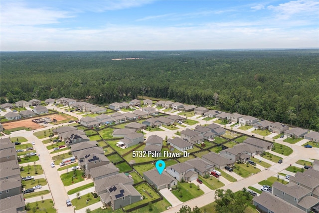 5732 Palm Flower Dr, Montgomery, TX 77316 - aerial view of property's location with a heavily wooded area and nearby suburban area