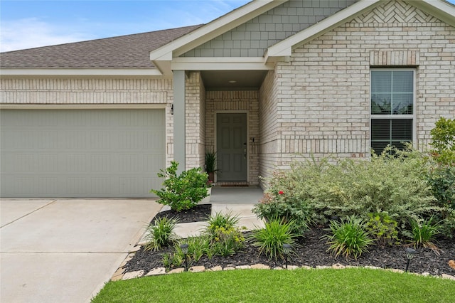 5732 Palm Flower Dr, Montgomery, TX 77316 - property entrance with an attached garage, concrete driveway, roof with shingles, and brick siding