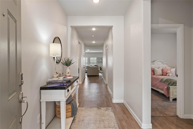 5732 Palm Flower Dr, Montgomery, TX 77316 - corridor featuring wood finished floors, baseboards, and recessed lighting
