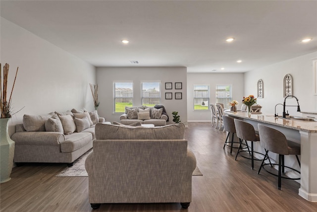 5732 Palm Flower Dr, Montgomery, TX 77316 - living room featuring recessed lighting, dark wood finished floors, and baseboards