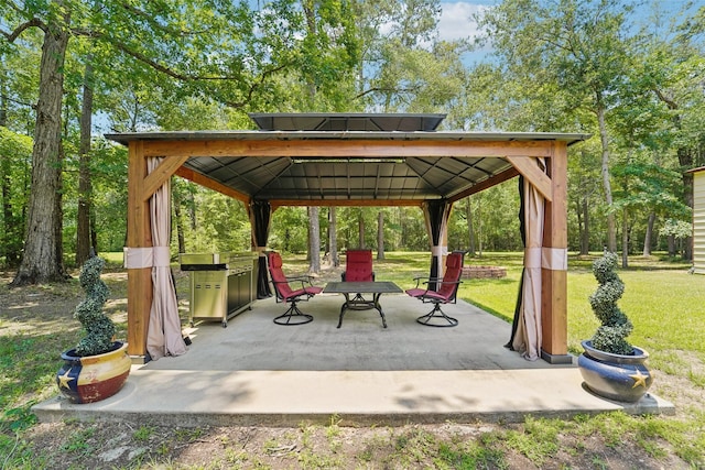 21885 Lost Mdw, New Caney, TX 77357 - view of patio / terrace with a gazebo and grilling area