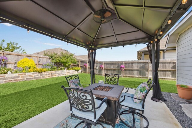 1010 Old Vine Rd, Brenham, TX 77833 - view of patio featuring a gazebo and an outdoor fire pit