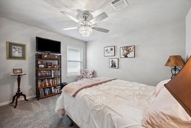 1010 Old Vine Rd, Brenham, TX 77833 - carpeted bedroom with baseboards and ceiling fan
