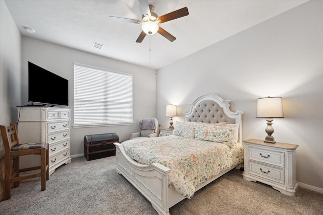 1010 Old Vine Rd, Brenham, TX 77833 - bedroom with light colored carpet, baseboards, and a ceiling fan