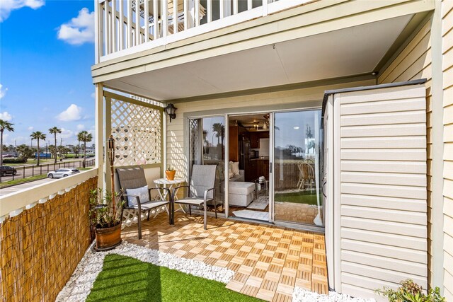 6300 Seawall Blvd Unit 9115, Galveston, TX 77551 - view of patio with a balcony