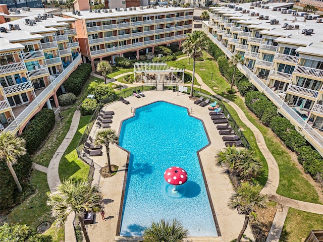 6300 Seawall Blvd Unit 9115, Galveston, TX 77551 - community pool featuring a pergola