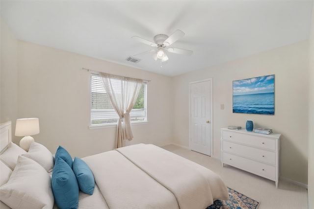 718 Presley Way, Sugar Land, TX 77479 - bedroom with light colored carpet, baseboards, and a ceiling fan