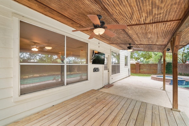 718 Presley Way, Sugar Land, TX 77479 - deck with ceiling fan, a fenced backyard, a patio area, and a pool with connected hot tub