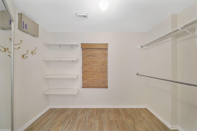 718 Presley Way, Sugar Land, TX 77479 - spacious closet with wood finished floors