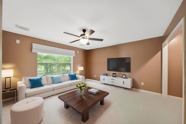 718 Presley Way, Sugar Land, TX 77479 - living area with a ceiling fan and carpet flooring