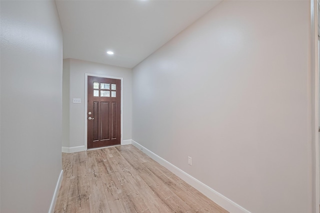 2902 Secluded Dr, Sugar Land, TX 77498 - entryway with baseboards, light wood-style flooring, and recessed lighting