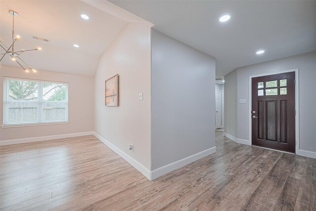 2902 Secluded Dr, Sugar Land, TX 77498 - foyer entrance featuring wood finished floors, a chandelier, healthy amount of natural light, recessed lighting, and baseboards