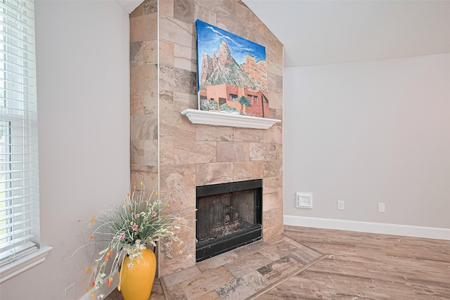 2902 Secluded Dr, Sugar Land, TX 77498 - detailed view of a large fireplace, wood finished floors, and baseboards