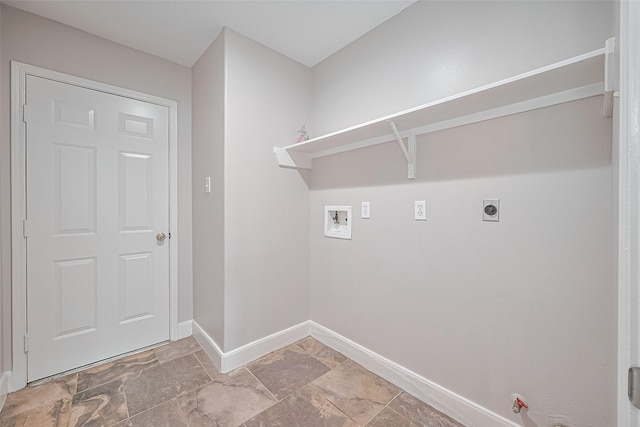 2902 Secluded Dr, Sugar Land, TX 77498 - laundry area with washer hookup, hookup for a gas dryer, baseboards, hookup for an electric dryer, and light stone finish flooring