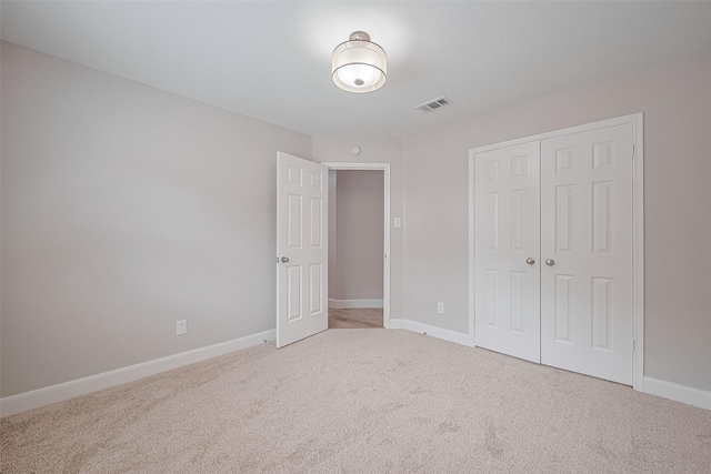 2902 Secluded Dr, Sugar Land, TX 77498 - unfurnished bedroom featuring carpet, a closet, and baseboards