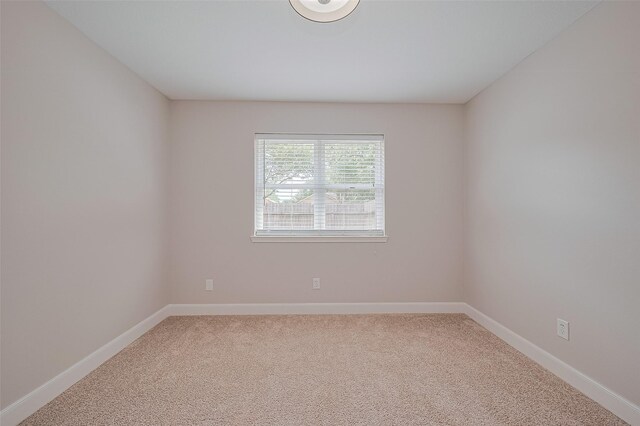 2902 Secluded Dr, Sugar Land, TX 77498 - carpeted empty room featuring baseboards