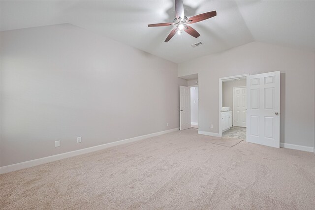 2902 Secluded Dr, Sugar Land, TX 77498 - unfurnished bedroom featuring lofted ceiling, light carpet, baseboards, ensuite bath, and a ceiling fan