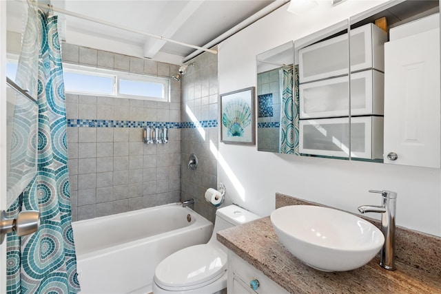 512 Surf Dr, Freeport, TX 77541 - full bath featuring shower / bath combo with shower curtain, vanity, and toilet