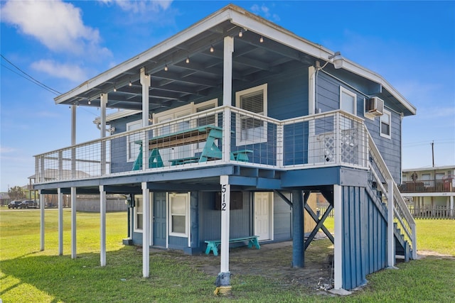 512 Surf Dr, Freeport, TX 77541 - rear view of property with a yard, a deck, stairs, and cooling unit
