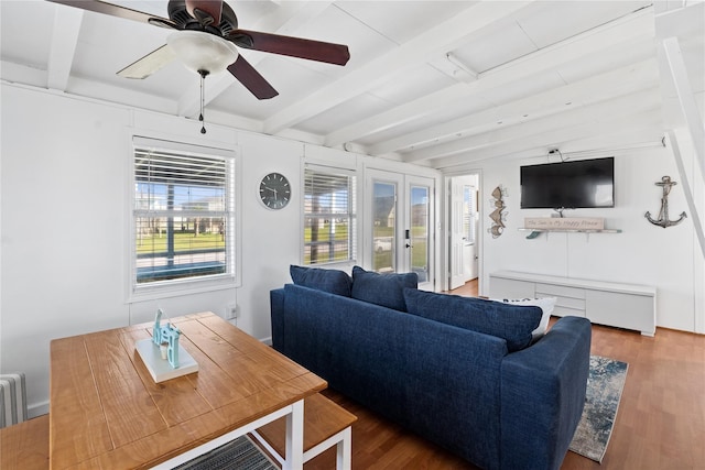 512 Surf Dr, Freeport, TX 77541 - living room featuring beam ceiling, wood finished floors, ceiling fan, and french doors