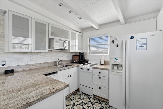 512 Surf Dr, Freeport, TX 77541 - kitchen featuring white appliances, a sink, tasteful backsplash, beamed ceiling, and glass insert cabinets