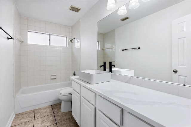 1919 W Welsford Dr, Spring, TX 77386 - bathroom featuring double vanity, toilet, bathing tub / shower combination, and tile patterned floors