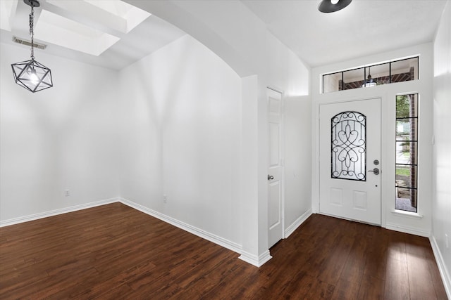 1919 W Welsford Dr, Spring, TX 77386 - entryway featuring dark wood-type flooring, baseboards, and arched walkways