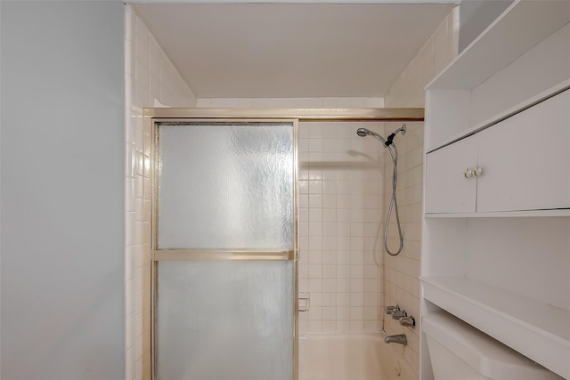 1016 Tri Oaks Ln Unit 92, Houston, TX 77043 - bathroom featuring shower / bath combination with glass door
