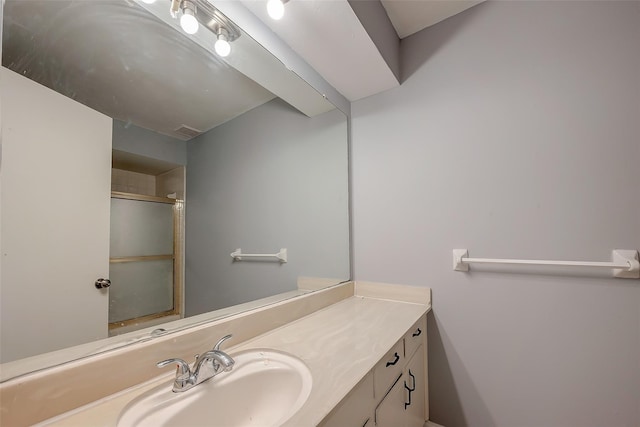 1016 Tri Oaks Ln Unit 92, Houston, TX 77043 - bathroom with vanity and a shower with door