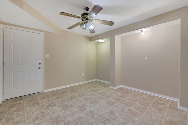 360 Holiday Ln, Coldspring, TX 77331 - empty room featuring ceiling fan and baseboards